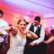 Bride celebrating on the dance floor 