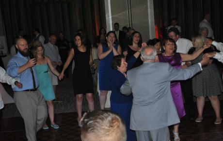  Bride and groom share a dance with their wedding guests