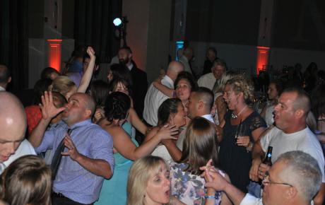  Bride and groom share a dance with their wedding guests