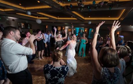 Wedding DJ has everyone Dancing at Abenaqui Country Club - Rye NH. Photo by Rick Bouthiette Photography