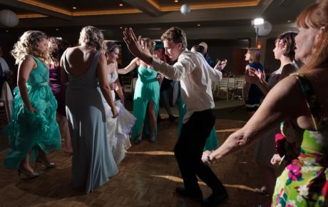 Wedding DJ has everyone Dancing at Abenaqui Country Club - Rye NH. Photo by Rick Bouthiette Photography