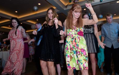 Wedding DJ has everyone Dancing at Abenaqui Country Club - Rye NH. Photo by Rick Bouthiette Photography