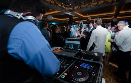 Wedding DJ has everyone Dancing at Abenaqui Country Club - Rye NH. Photo by Rick Bouthiette Photography
